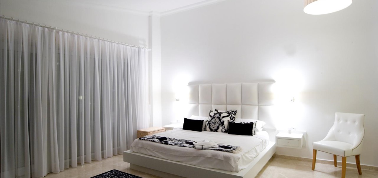 Spacious double bedroom with modern decor